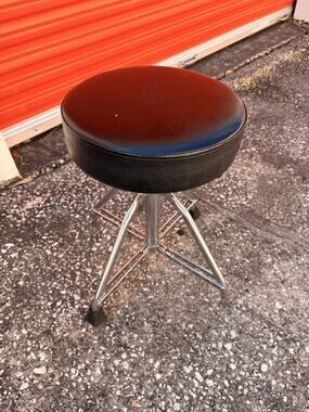 Bench for drummer. Adjustable height to play musical instruments Drums
